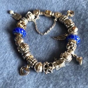 Pandora two tone bracelet w / 20 charms and safety
